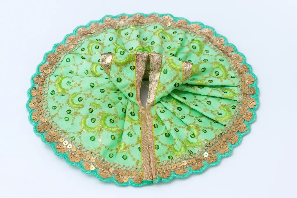 Green colour poshak for ladoo Gopala